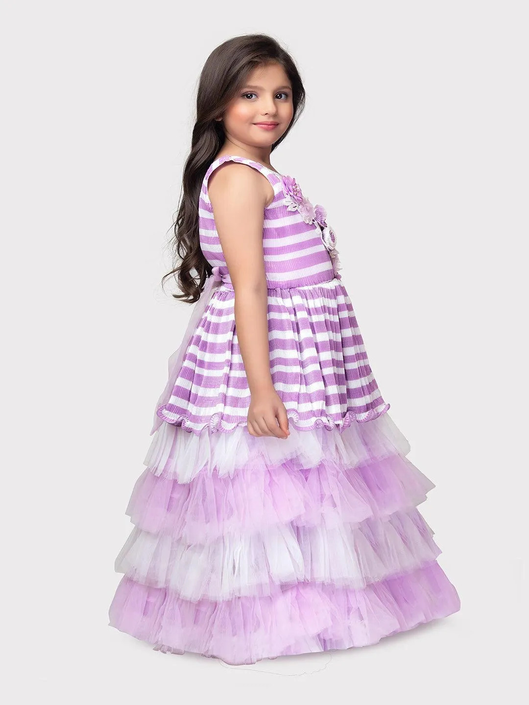 Lilac Coloured Stripes Fabric Peplum Style With Frills Of Imported Net Gown For Girls